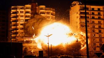 A view shows the moment of an Israeli strike on a building, amid the ongoing hostilities between Hezollah and Israeli forces, in the Chiyah district of Beirut's southern suburbs, Lebanon, on Monday. Reuters