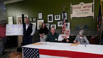 Town officials count the ballots after voters cast their ballots on Election Day, Tuesday, Nov. 5, 2024, in Dixville Notch, N.H. (Photo: AP)
