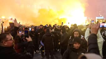 A picture from Israeli Maccabi Tel Aviv supporters demonstrating and lighting flares in Amsterdam before the football match. Image: Reuters