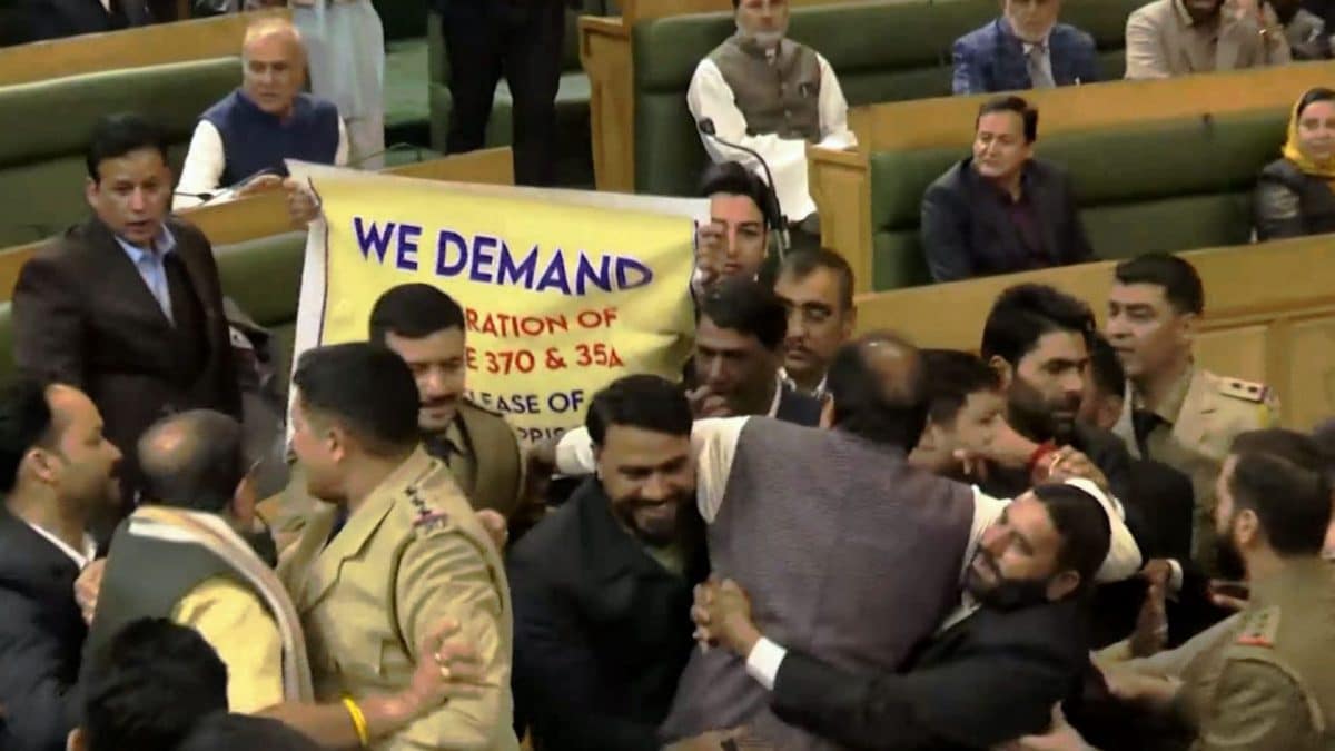 Watch | Ruckus in J&K Assembly, some MLAs marshalled out after clash over Article 370