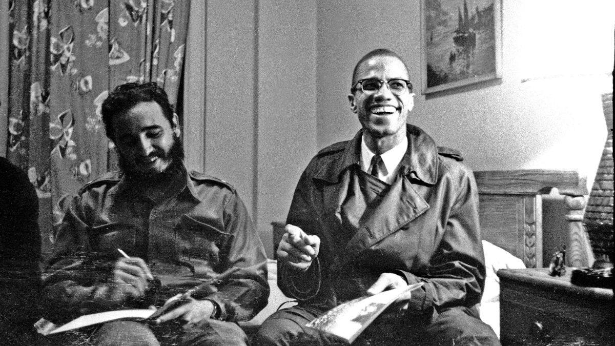 Fidel Castro shares a laugh with Malcolm X at the Hotel Theresa in New York, US, October 19, 1960. File Image/Reuters