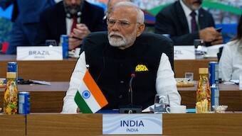 Prime Minister Narendra Modi listens as President Joe Biden, not pictured, delivers remarks during an event launching the Global Alliance Against Hunger and Poverty at the G20 Summit at the Museum of Modern Art in Rio de Janeiro, Brazil on November. 18, 2024. Reuters