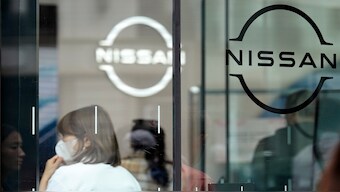 Logos at a Nissan showroom are seen in Ginza shopping district in Tokyo, on March 31, 2023. AP File