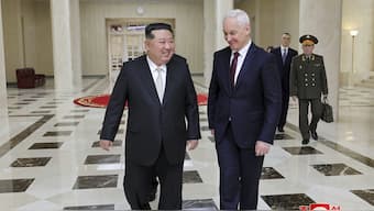 In this photo provided by the North Korean government, North Korean leader Kim Jong Un, left, meets Russian Defense Minister Andrei Belousov in Pyongyang, North Korea Friday, Nov. 29, 2024. Independent journalists were not given access to cover the event depicted in this image distributed by the North Korean government. The content of this image is as provided and cannot be independently verified. Korean language watermark on image as provided by source reads: "KCNA" which is the abbreviation for Korean Central News Agency. (Korean Central News Agency/Korea News Service via AP)