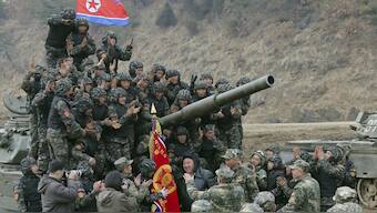 North Korean leader Kim Jong Un, center, meets soldiers who took part in a training in North Korea, on March 13, 2024. File Image/Reuters via KCNA