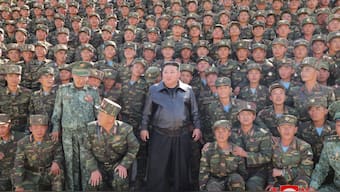 North Korea's leader Kim Jong-Un (centre) poses with troops. Source: KCNA via KNS | AFP | File.