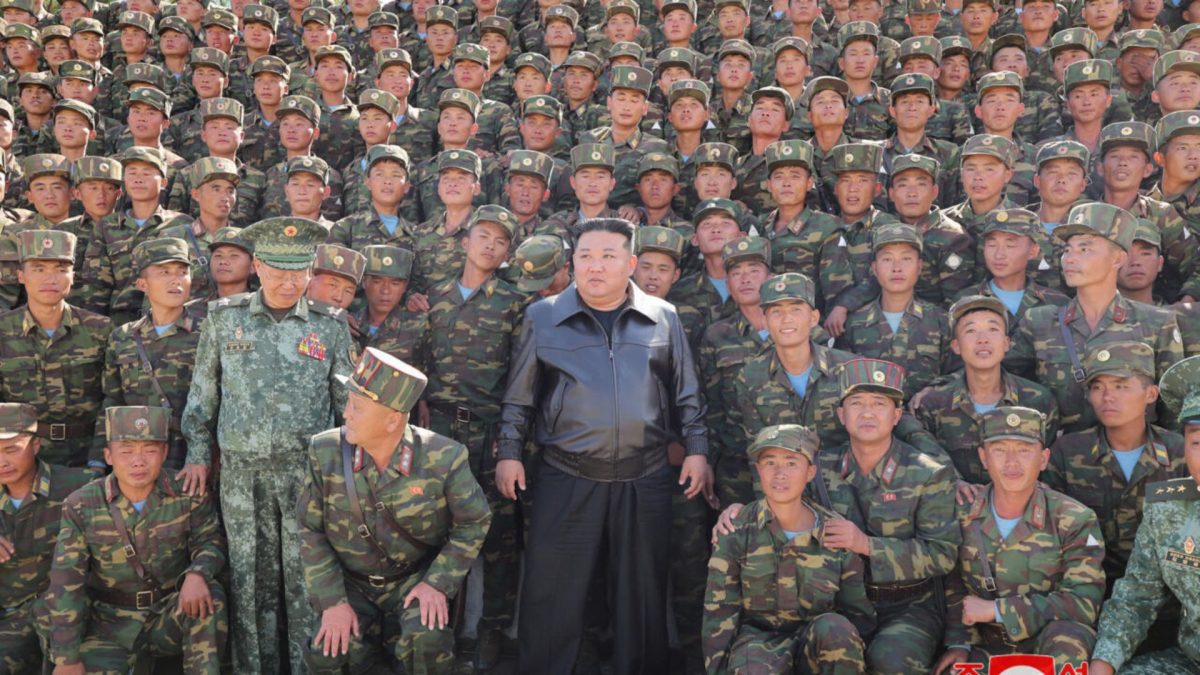 North Korea's leader Kim Jong-Un (centre) poses with troops. Source: KCNA via KNS | AFP | File. North Korea's leader Kim Jong-Un (centre) poses with troops. Source: KCNA via KNS | AFP | File.