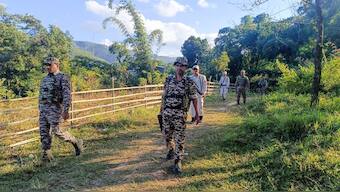 Security personnel during a search operation and area domination in the vulnerable areas of hill and valley districts of Manipur. PTI 