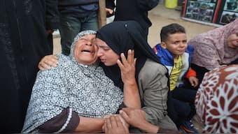 Palestinians mourn relatives killed in an Israeli strike on displacement tents in the vicinity earlier, at the the Al Aqsa Martyrs hospital in Deir el-Balah in the central Gaza Strip on November 5, 2024, amid the ongoing war between Israel and the Palestinian Hamas movement. AFP File