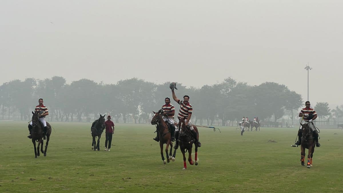 Playing for the Jaipur Delta polo team, (L to R) Santiago Marambio, Sawai Padmanabh Singh, Hurr Ali and Lt Col Vishal Chauhan are seen celebrating after winning the final of the Sir Pratap Singh Polo Cup at the Jaipur Polo Ground in New Delhi, November 17, 2024. Anmol Singla/Firstpost