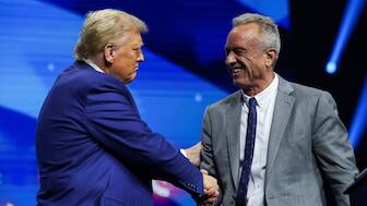 Robert F Kennedy Jr and Republican presidential nominee and former US President Donald Trump greet each other at a campaign event in Duluth, Georgia, US, October 23, 2024. File Image/Reuters