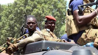 Burkina Faso's new military leader Ibrahim Traore is escorted by soldiers in Ouagadougou. (Reuters)