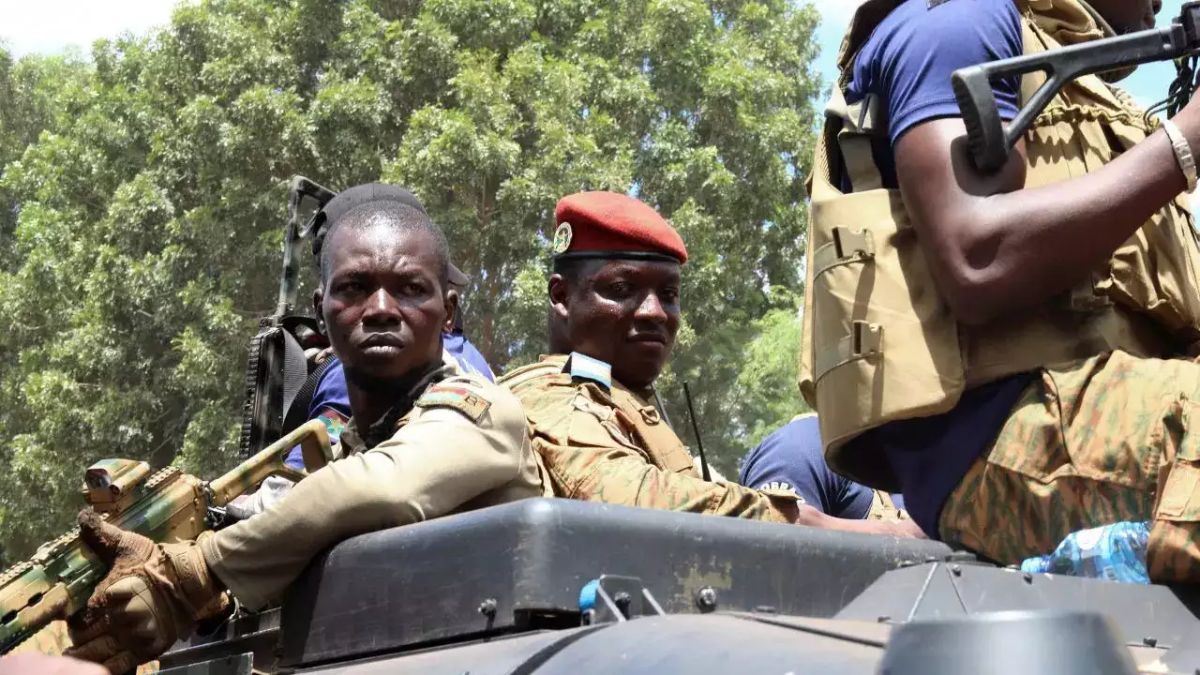 Burkina Faso's new military leader Ibrahim Traore is escorted by soldiers in Ouagadougou. (Reuters) Burkina Faso's new military leader Ibrahim Traore is escorted by soldiers in Ouagadougou. (Reuters)