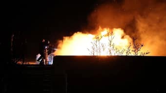 In this photo provided by the Ukrainian Emergency Services on Nov. 21, 2024, rescue workers put out a fire of a building which was heavily damaged by a Russian strike on Dnipro, Ukraine. (Ukrainian Emergency Service via AP)

