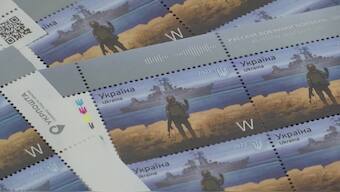The phrase, "Russian warship, go f*** yourself" has been immortalised in this Ukrainian stamp showing a soldier giving a ship the middle finger, a profane gesture. Reuters
