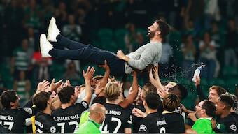 Sporting CP coach Ruben Amorim and players celebrate after beating Manchester City. Reuters image
