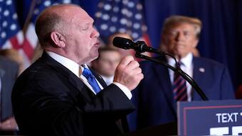 Tom Homan speaks as Donald Trump listens at a primary election night party in Nashua, N.H., on January 23, 2024. AP File