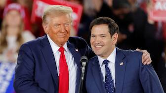 Republican presidential nominee and former US President Donald Trump and and Senator Marco Rubio (R-FL) react during a campaign event at Dorton Arena, in Raleigh, North Carolina, US, November 4, 2024. File Image/Reuters