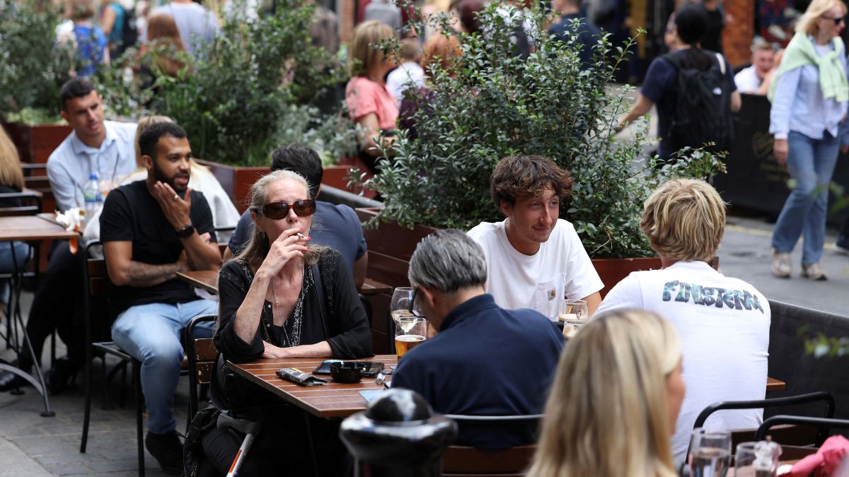A woman smokes outside a pub at Covent Garden in London, UK, August 29, 2024. File Image/Reuters A woman smokes outside a pub at Covent Garden in London, UK, August 29, 2024. File Image/Reuters