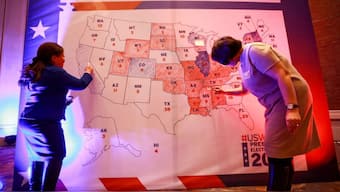 People colour the US electoral map during the 2020 US presidential election at the US Embassy in Ulaanbaatar, Mongolia. File Image/AFP