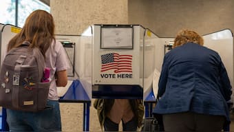 Voters cast their ballots in early voting in New York City on November 1, 2024. AFP