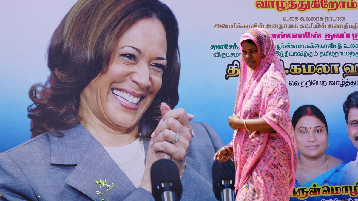 A woman walks past a banner of US Vice President Kamala Harris installed alongside a road in the village of Thulasendrapuram, where Harris's maternal grandfather was born more than a century ago, in the southern state of Tamil Nadu, July 27, 2024. File Photo/Reuters A woman walks past a banner of US Vice President Kamala Harris installed alongside a road in the village of Thulasendrapuram, where Harris's maternal grandfather was born more than a century ago, in the southern state of Tamil Nadu, July 27, 2024. File Photo/Reuters