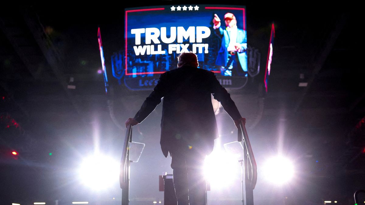 FILE PHOTO: Republican presidential nominee and former U.S. President Donald Trump gets on stage to deliver remarks during a rally at Lee's Family Forum in Henderson, Nevada, U.S. October 31, 2024. REUTERS FILE PHOTO: Republican presidential nominee and former U.S. President Donald Trump gets on stage to deliver remarks during a rally at Lee's Family Forum in Henderson, Nevada, U.S. October 31, 2024. REUTERS