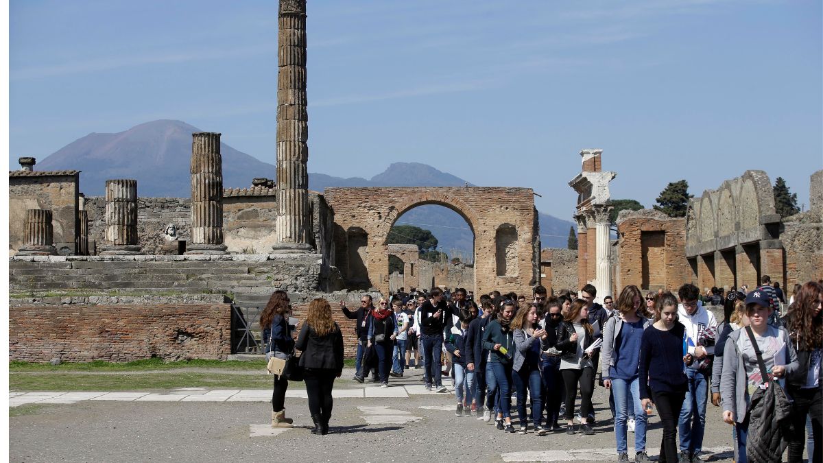 FILE - Tourists walk through Pompeii near the Villa of Mysteries in Italy. AP FILE - Tourists walk through Pompeii near the Villa of Mysteries in Italy. AP