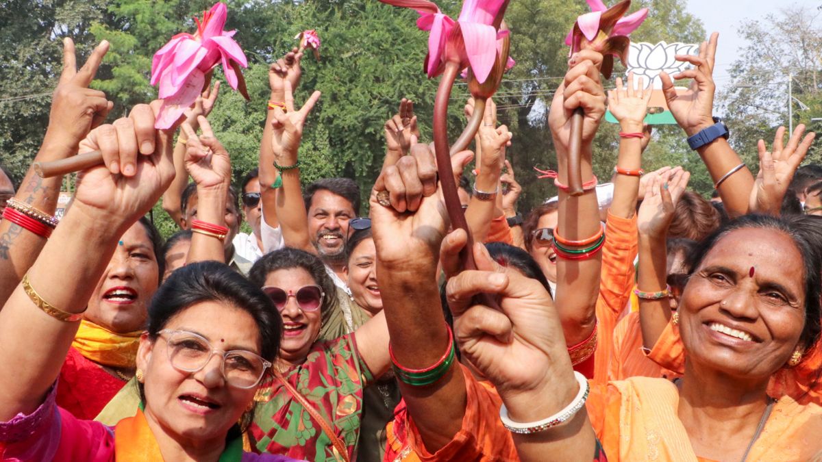 BJP women workers hold lotus while celebrating NDA's win Maharashtra Assembly elections, in Nagpur, November 23, 2024. PTI BJP women workers hold lotus while celebrating NDA's win Maharashtra Assembly elections, in Nagpur, November 23, 2024. PTI