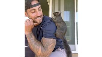 This undated image provided by Mark Longo shows him with his pet squirrel Peanut that was seized by officers from state Department of Environmental Conservation, at Longo's home in rural Pine City, NY, Wednesday, Oct 30, 2024. (Courtesy Mark Longo via AP)