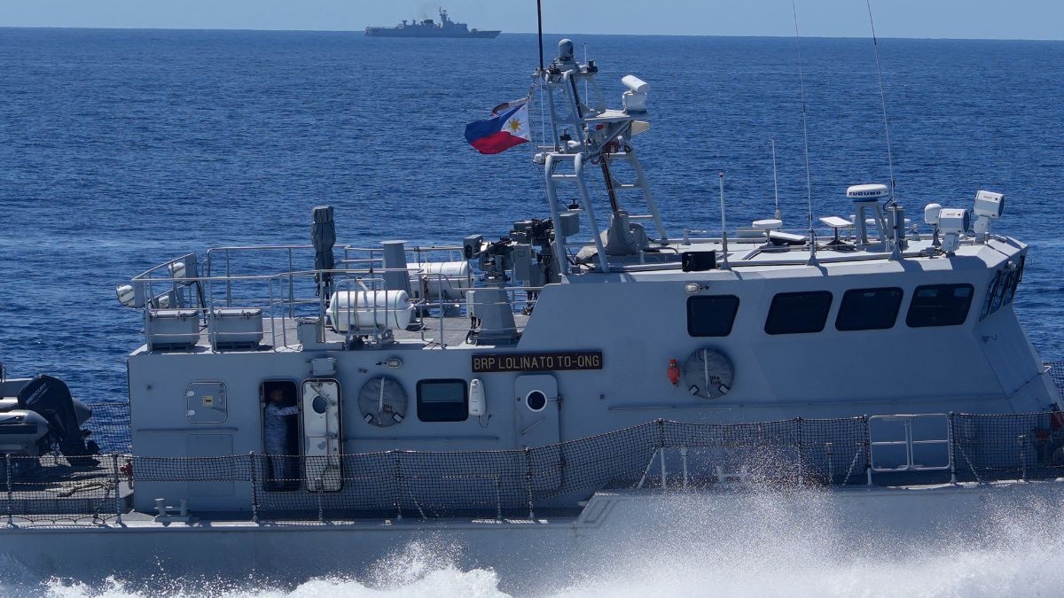 China carries out military drills at disputed shoal west of Philippines – Firstpost