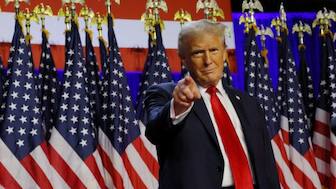 Donald Trump takes the stage to address supporters at his rally, at the Palm Beach County Convention Centre in West Palm Beach, Florida, US, November 6, 2024. Reuters
