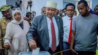 Presidential candidate Abdirahman Mohamed Abdullahi, centre, casts his vote inside a polling station during the presidential election in Hargeisa, Somaliland, Wednesday, Nov. 13, 2024. AP