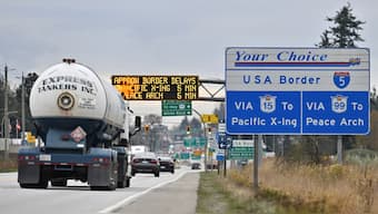Commercial trucks head towards the U.S. Customs and Border Protection (CBP) Pacific Highway Port of Entry from south Surrey, British Columbia, Canada, November 26, 2024. Reuters 
