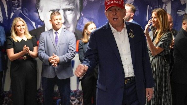 Millions vote in tight US presidential election as Harris and Trump await results
