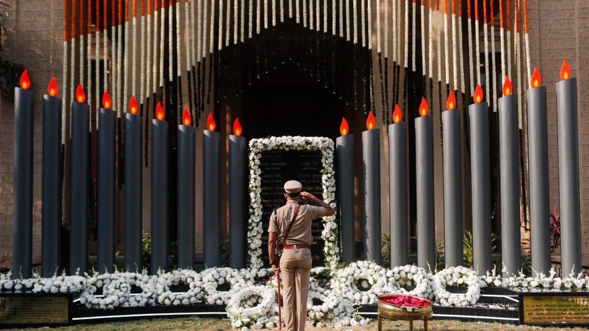 A police officer pays his respects at a memorial to mark the 12th anniversary of the November 26, 2008 attacks, in Mumbai A police officer pays his respects at a memorial to mark the 12th anniversary of the November 26, 2008 attacks, in Mumbai