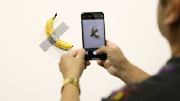 The bizarre case of a duct-taped banana that fetched $6.2 million at New York art auction
