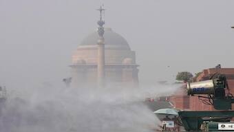 An anti-smog gun being used to spray water droplets to curb air pollution, at Raisina Hills in New Delhi. PTI