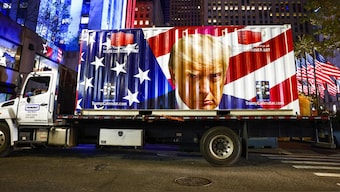 A truck displays a picture Republican presidential nominee, former U.S. President Donald Trump as supporters gather at Rockefeller Center in New York City. AFP