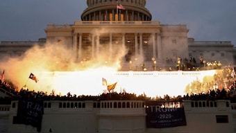 An explosion caused by a police munition is seen while supporters of US President Donald Trump riot at the US Capitol Building in Washington, US, January 6, 2021. File Image/Reuters