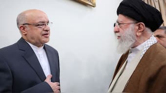 Iran's Supreme Leader Ayatollah Ali Khamenei meets with Iran's Ambassador in Lebanon Mojtaba Amani, who was wounded when pagers used by Hezbollah detonated on September across Lebanon, in Tehran, Iran, on November 17, 2024. The image was posted on Khamenei's X handle amid speculation about his health. Reuters