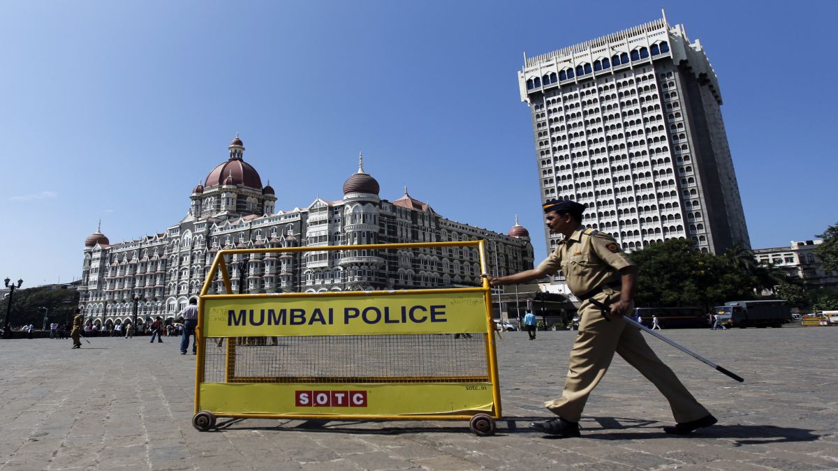 A policeman pushes a barricade to be erected in front of the Taj Mahal Hotel in Mumbai. The iconic hotel was one of the many spots that the 10 terrorists targeted on the night of November 26, 2008, which is now remembered as the 26/11 attacks. File image/Reuters A policeman pushes a barricade to be erected in front of the Taj Mahal Hotel in Mumbai. The iconic hotel was one of the many spots that the 10 terrorists targeted on the night of November 26, 2008, which is now remembered as the 26/11 attacks. File image/Reuters