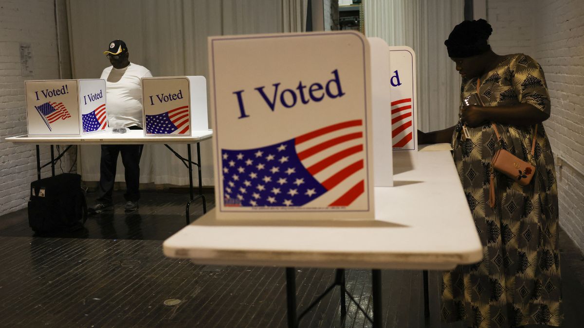 People vote in the 2024 US presidential election on Election Day, at the Mattress Factory in Pittsburgh, Pennsylvania, US, November 5, 2024. File Image/Reuters People vote in the 2024 US presidential election on Election Day, at the Mattress Factory in Pittsburgh, Pennsylvania, US, November 5, 2024. File Image/Reuters