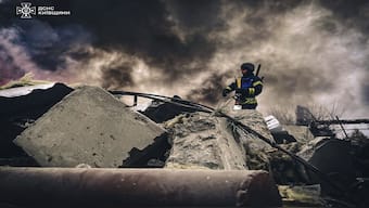 A firefighter working at the site of a Russian strike in Brovary, near Kyiv, amid the Russian invasion of Ukraine. It's been 1,000 days of this war. AFP