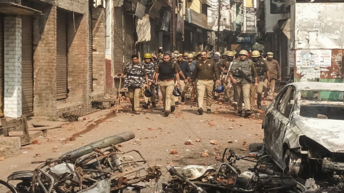 Police and security personnel stand guard amid violence in Sambhal over the survey at the mosque. PTI Police and security personnel stand guard amid violence in Sambhal over the survey at the mosque. PTI