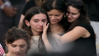 Supporters cry after Kamala Harris delivers a concession speech for the 2024 presidential election on the campus of Howard University in Washington. Trump's win has led many to consider moving out of the US, fearing their future in the country. AP
