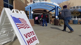 Voters head to the polls at Valley View Elementary School Gym on Election Day in Rapid City. AP