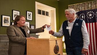 Residents of Dixville Notch cast their ballots in the US election at midnight in the living room of the Tillotson House at the Balsams Grand Resort, marking the first votes in the US election, in Dixville Notch, New Hampshire on November 5. AFP