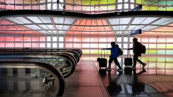 Travellers walk through Chicago O'Hare International Airport during the week of Thanksgiving in Chicago, Illinois, US, November 27, 2024. Representational Image/Reuters