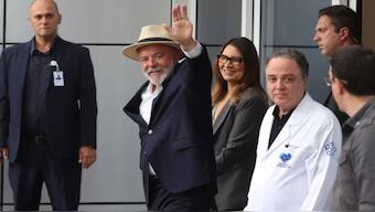 President Lula leaves hospital in São Paulo after surgery alongside the first lady, Rosângela da Silva. Reuters